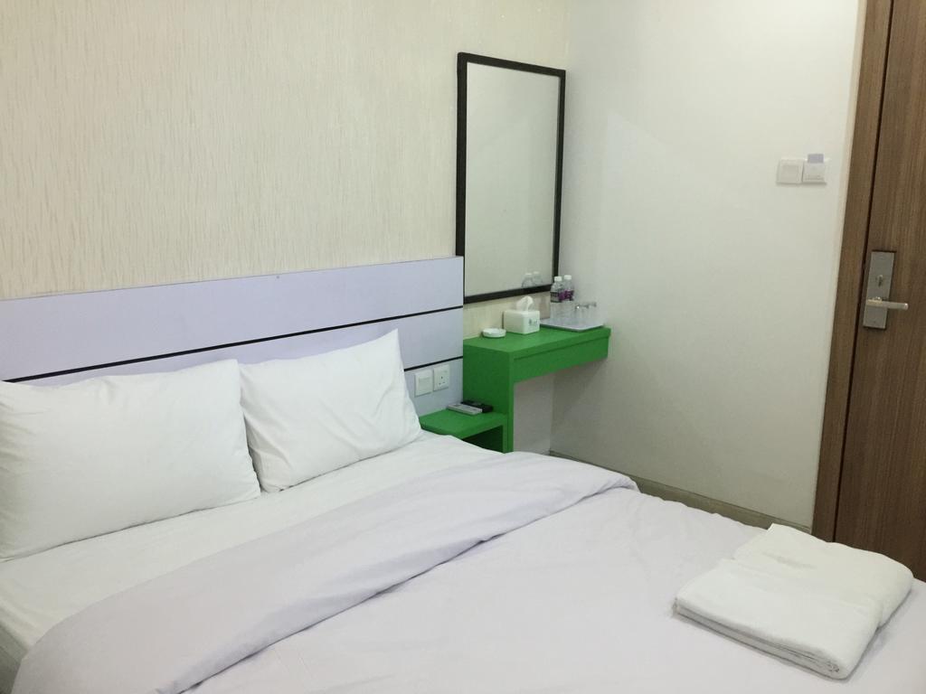 Redlink Hotel Batam Стая снимка
