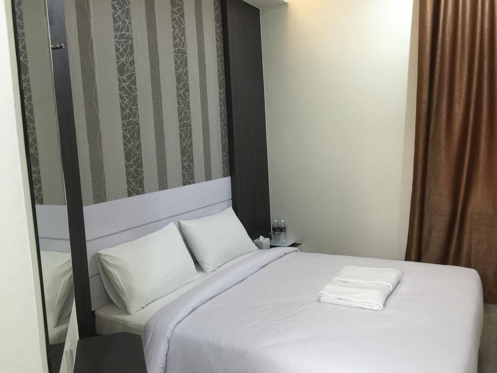 Redlink Hotel Batam Стая снимка